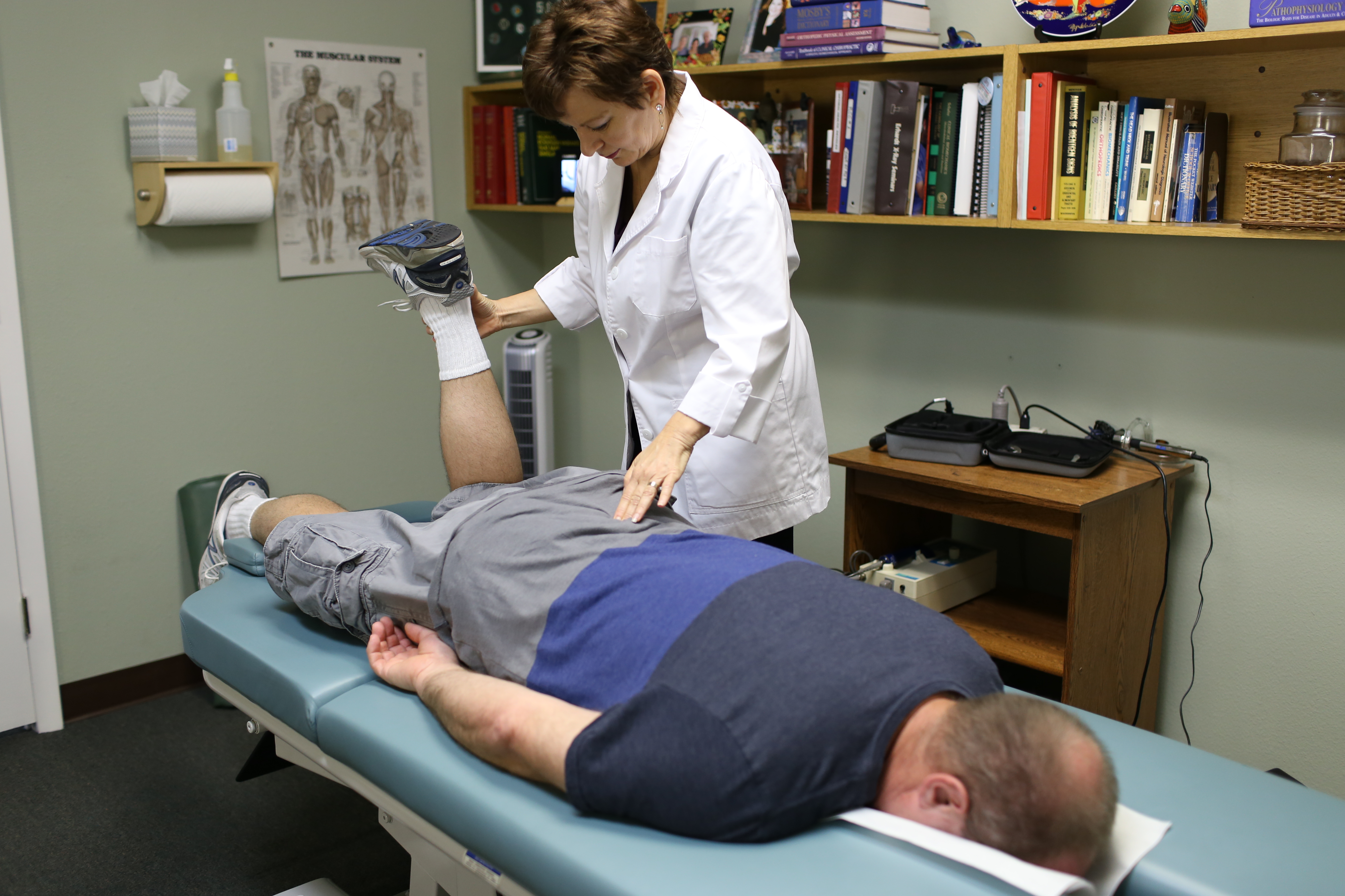 Impulse iQ chiropractic exam in progress